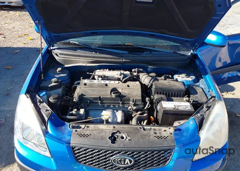 2009 Kia Rio Lx from USA, damaged, VIN KNADE223796515591